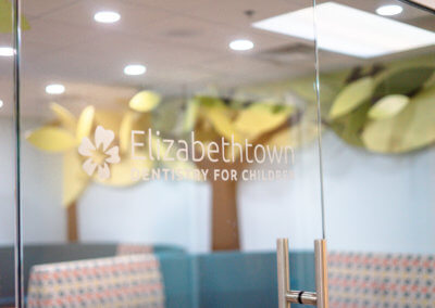 Etown DFC logo on glass doors